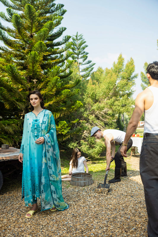 Model wearing Mushq Solace Amore MSL2509 luxury pastel embroidered suit from 2025 collection.