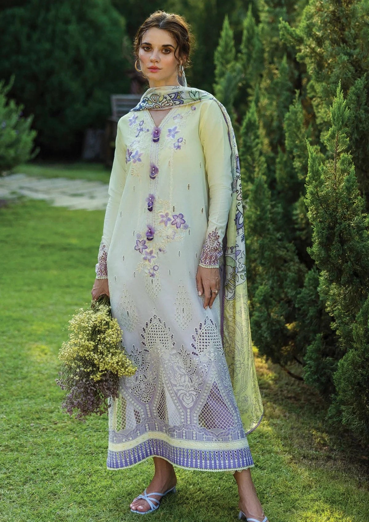 Model wearing Mushq Solace Gioia MSL2501 pastel embroidered formal dress from 2025 collection.