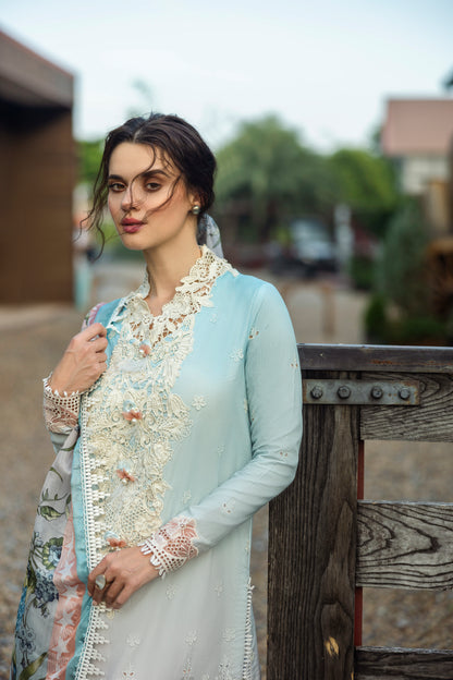 Model wearing Mushq Solace Casa MSL2510 pastel embroidered formal dress from 2025 collection.