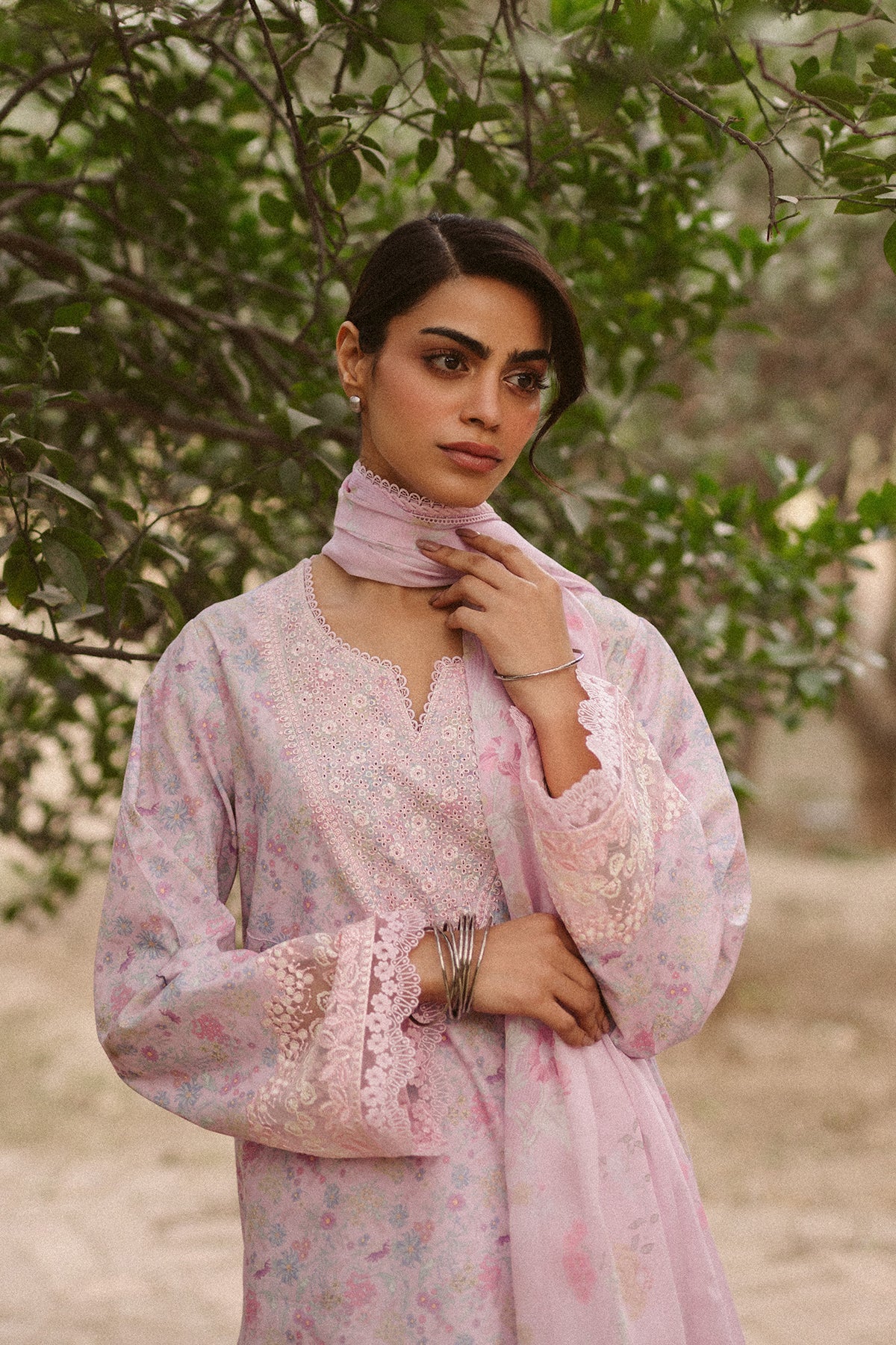 Close-up of detailed embroidery on Ayzel Selis AL-25-V10-06 designer outfit.